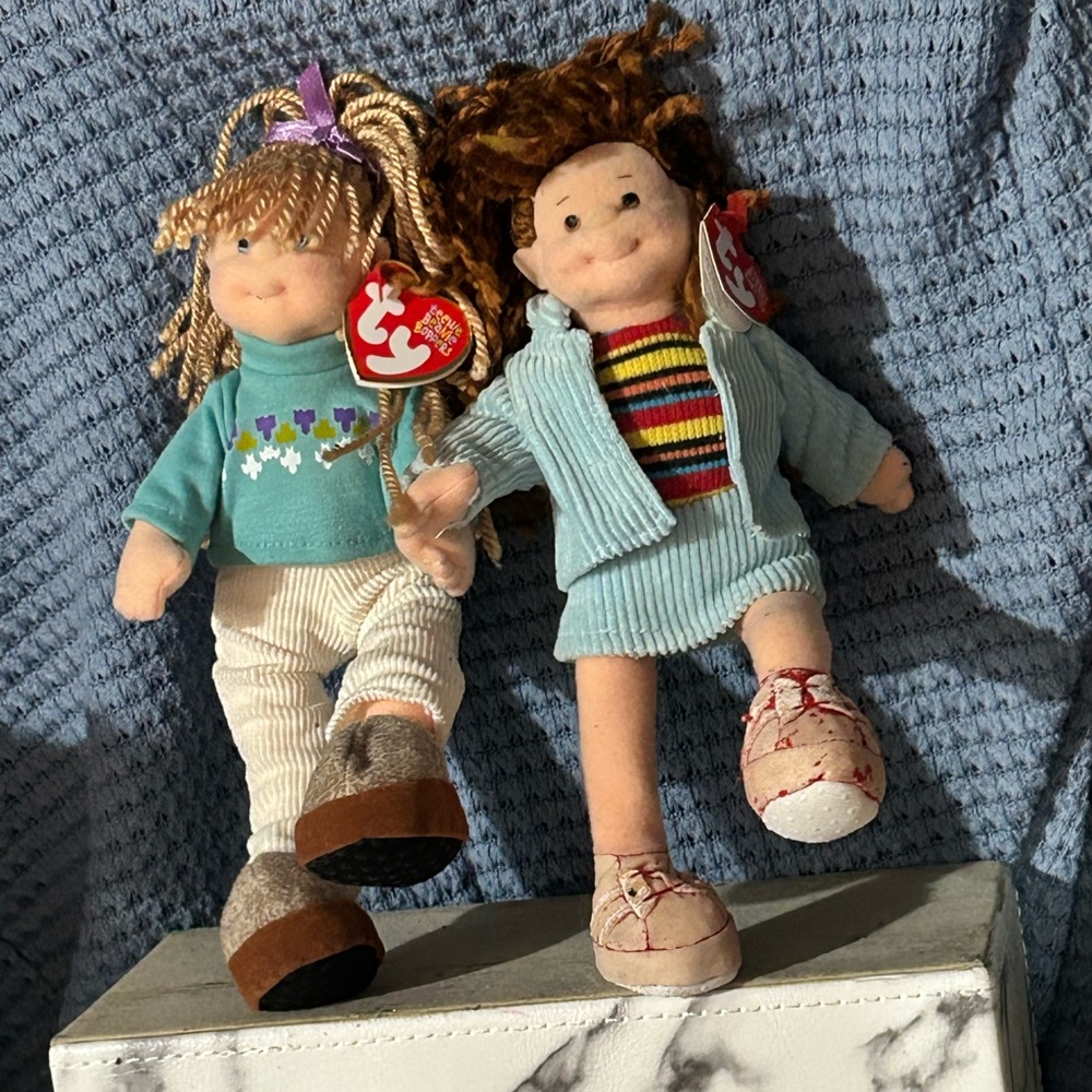 Adorable Plush Dolls with Teal and Multicolor Outfits